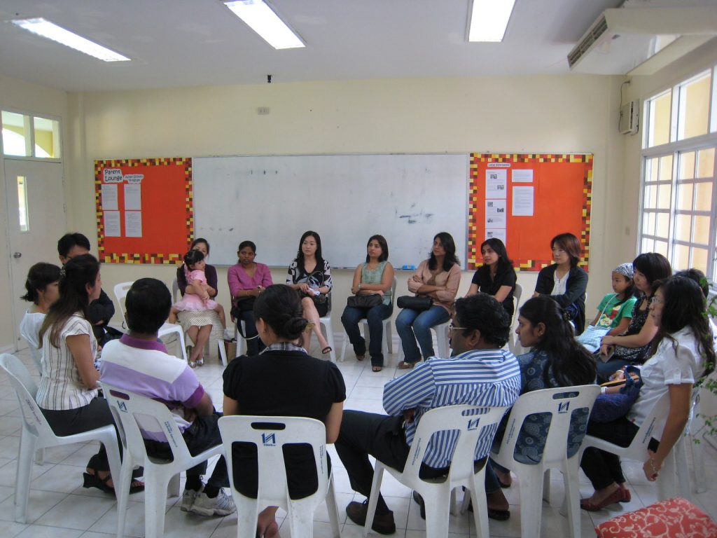 Parents meeting in small groups with homeroom teachers (parents of Grade 1 students)