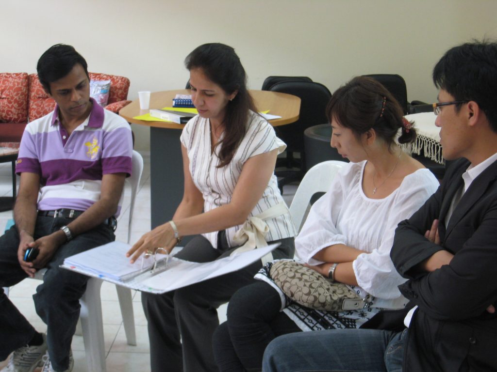 Grade 1 homeroom teacher sharing lesson plans with parents