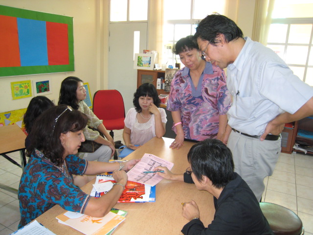 Parents getting familiar with school calendar with the help of IEP teacher