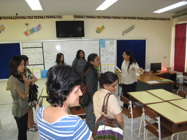 Parents visiting "play area" in Grade 4 classroom - teacher emphasizes that "play inspires creativity"