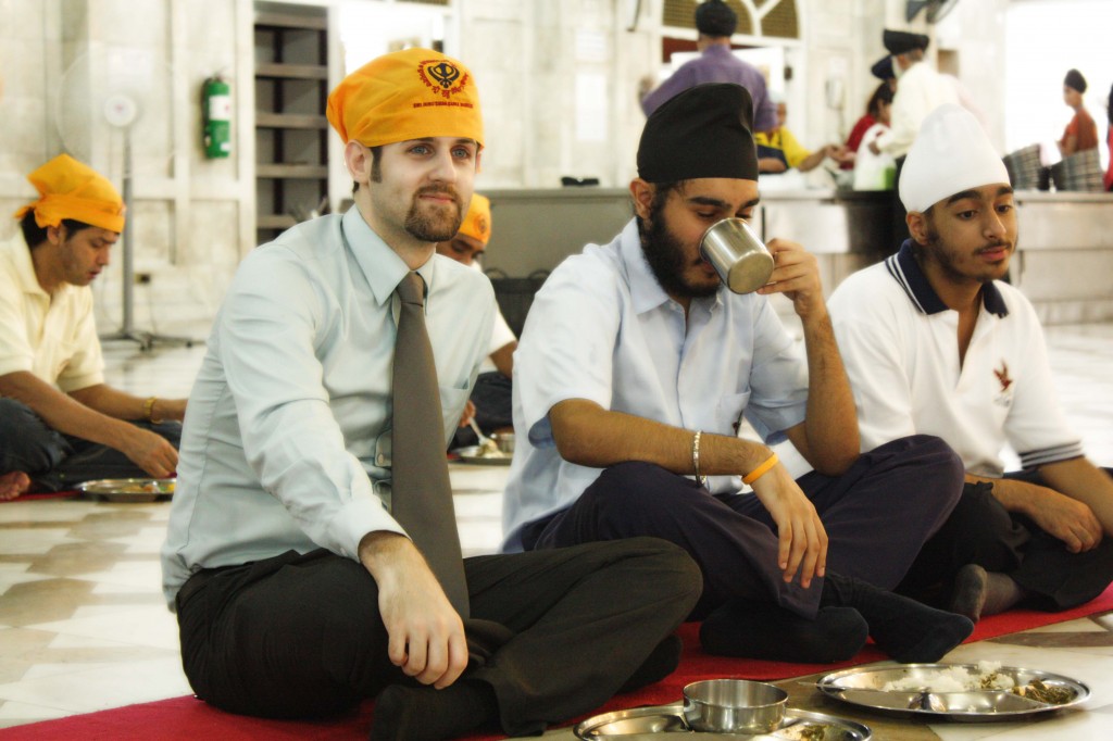 Mr. Jared, Nick and Visant relax after the meal and conversation.