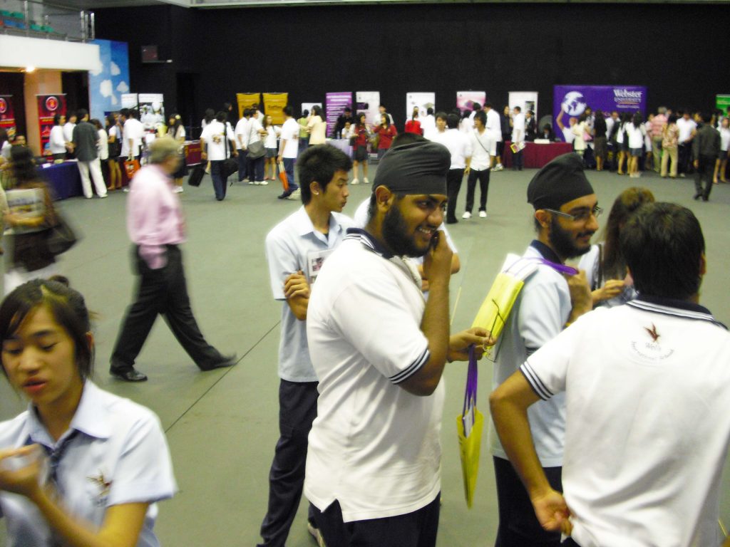 Wells students examining the various university booths