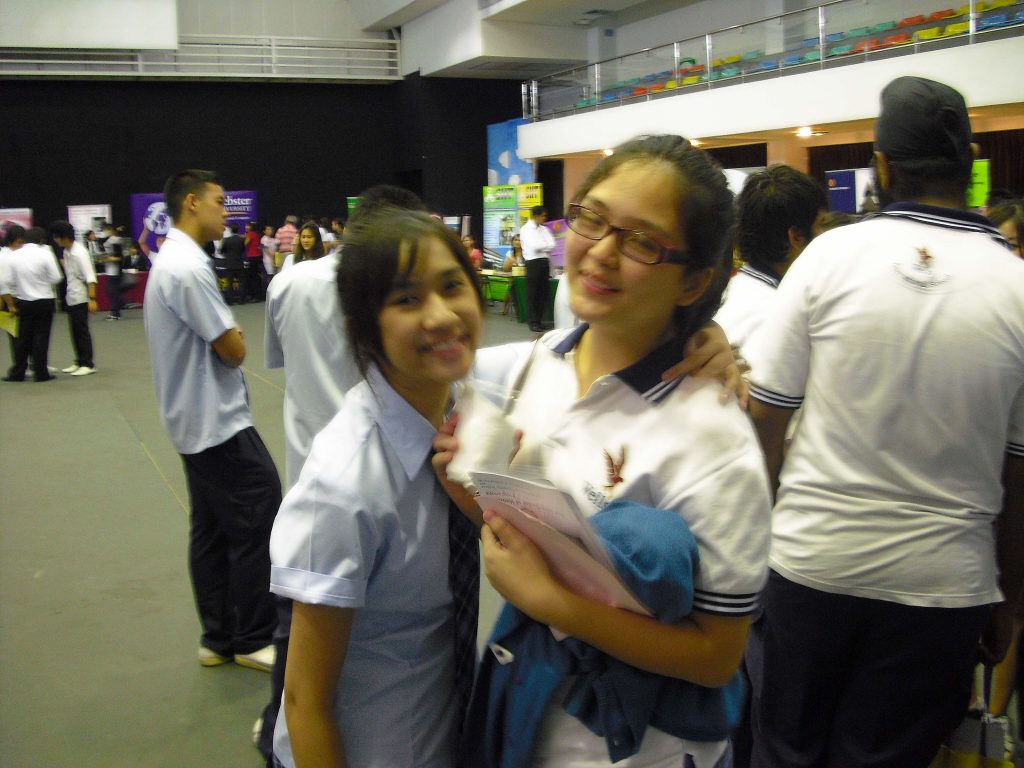 Tetee and Kelly pose for a photo at the fair