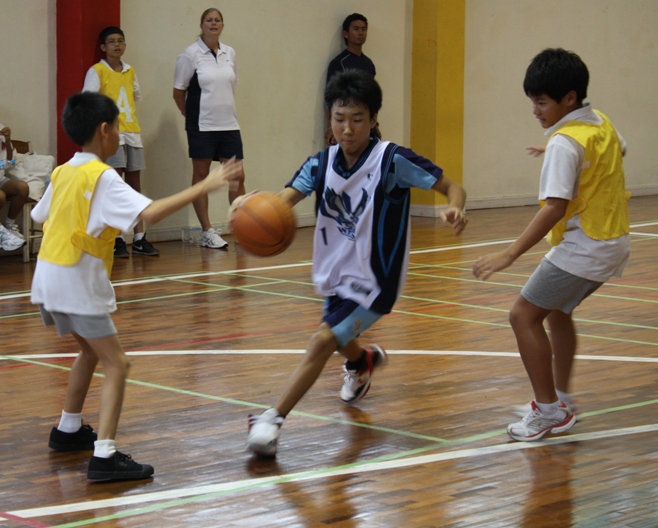 Ray (Gr. 7) weaving his way to the basket