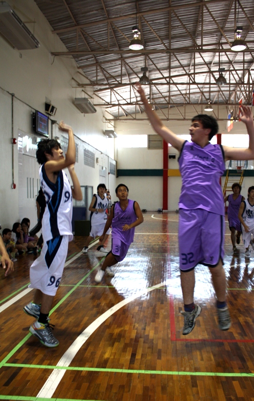 Junior power forward Saran draining a three-pointer.