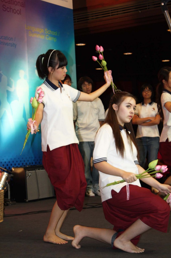 Amira and May perform a traditional dance